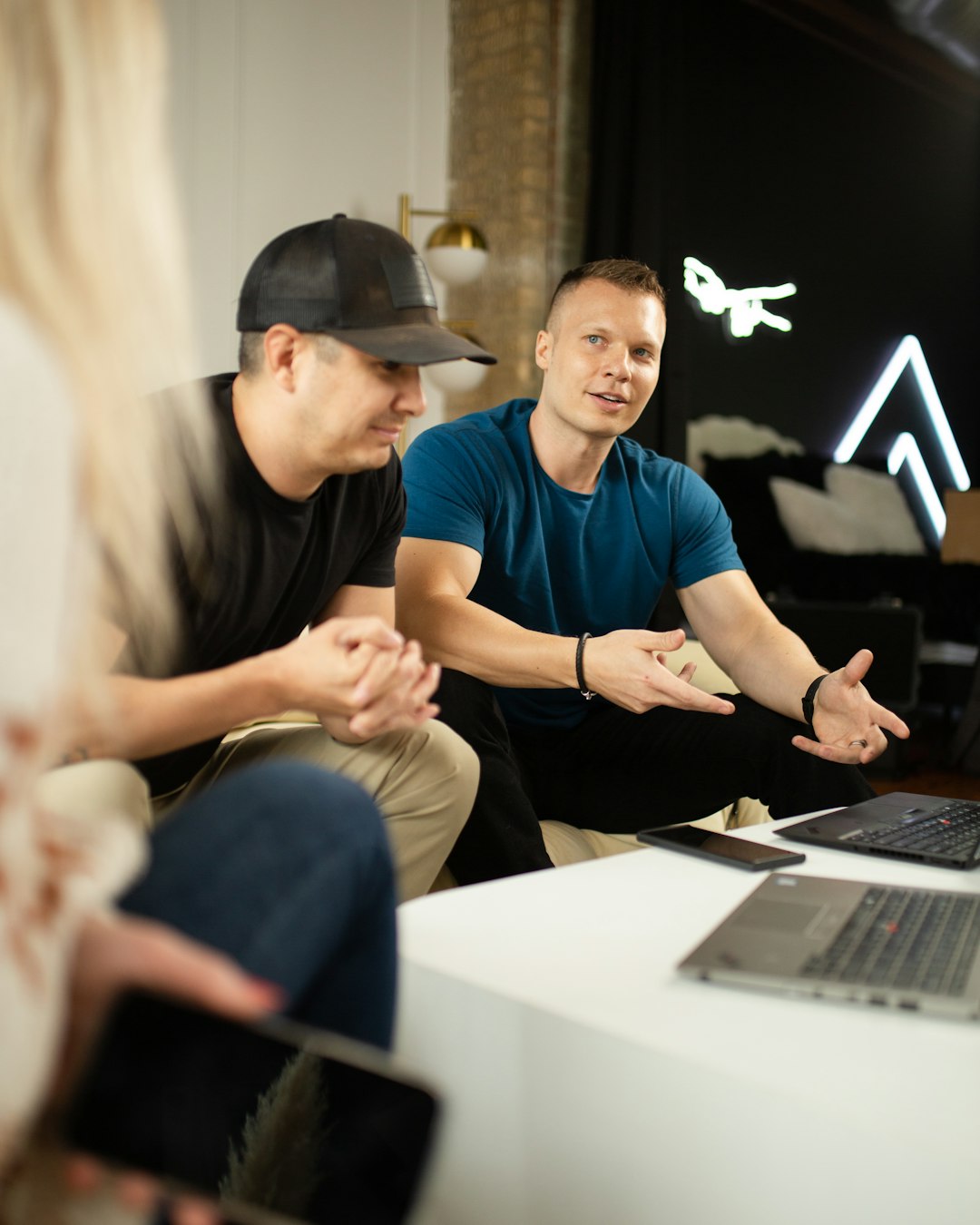 Man explaining an idea in a team meeting to discuss digital marketing